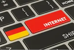 A keyboard with a red and black keyDescription automatically generated
