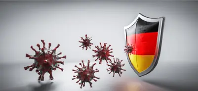 A shield with a flag and bacteriaDescription automatically generated